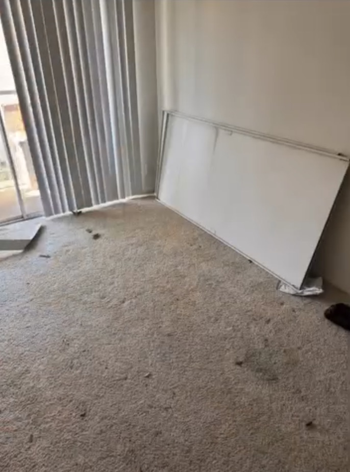 Same apartment room empty after the cleanout