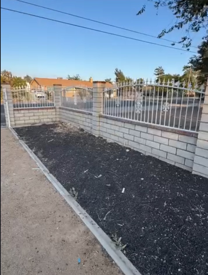 Same outdoor area clear after the furniture and bulk junk were removed