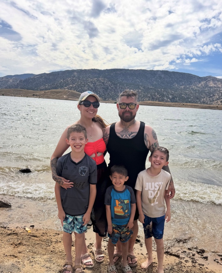 Owner of S&M Trash Junkers with his family by a Southern California lake